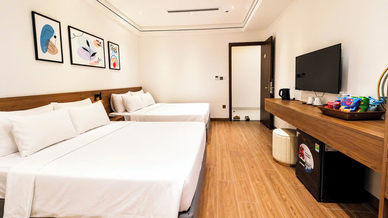 Familienzimmer | Minibar (mit einigen kostenlosen Artikeln), kostenloses WLAN, Bettwäsche