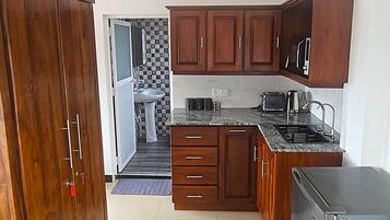 Fridge, microwave, electric kettle, toaster