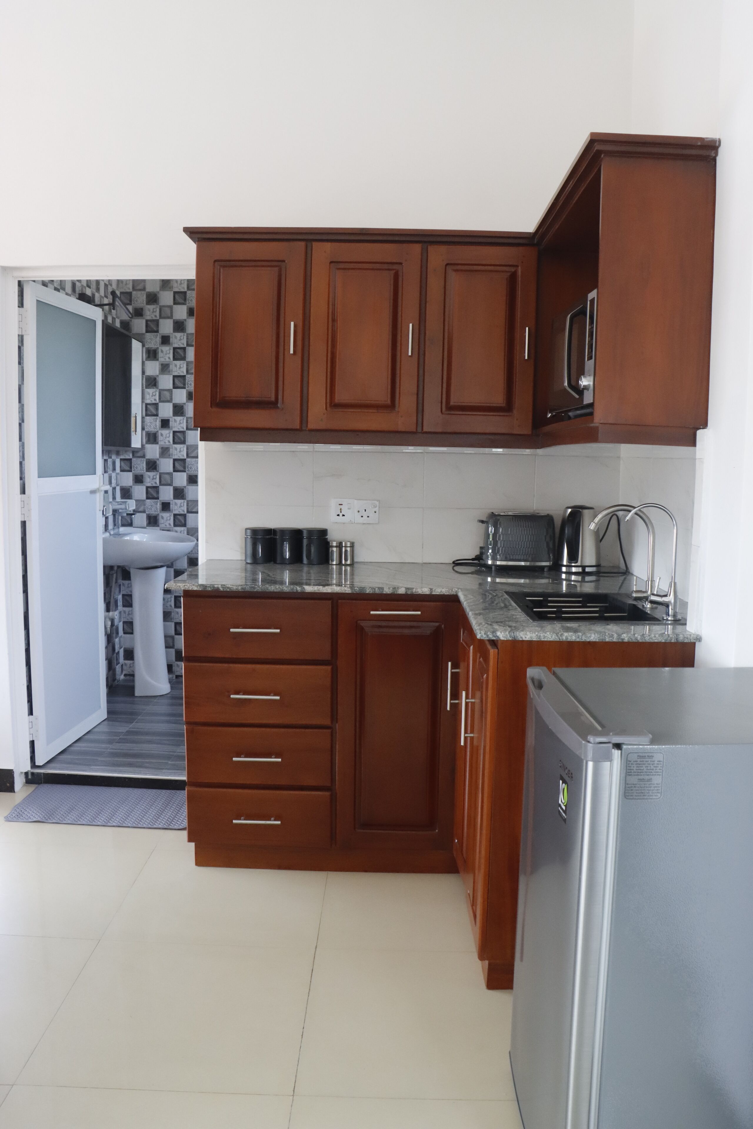 Fridge, microwave, electric kettle, toaster