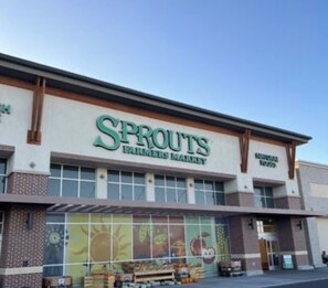 A building with a sign reading 'Sprouts Farmers Market'.