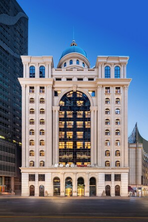 A large, historic building with a prominent dome and arched windows, likely a hotel or public building. - IntercityHotel Chongqing Jiefangbei Pedestrian Street (Chongqing)