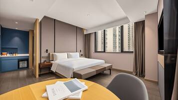 Deluxe Double Room, City View | Desk, laptop workspace, iron/ironing board, free WiFi