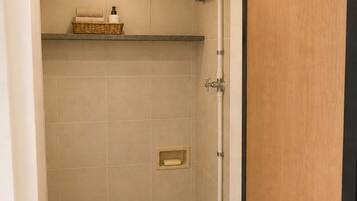 Shower, towels, soap, toilet paper