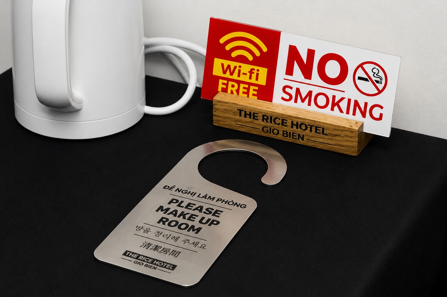 A hotel sign indicating Wi-Fi availability and a no-smoking policy.