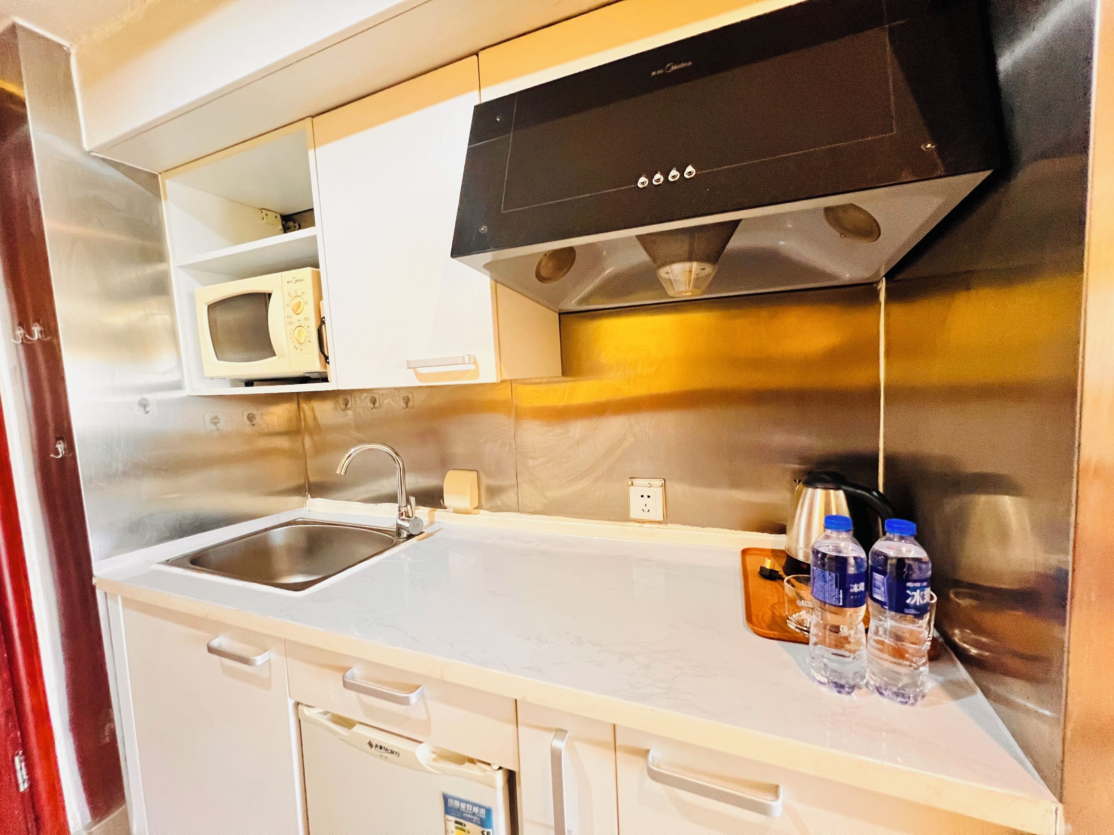 Fridge, microwave, stovetop, cookware/dishes/utensils