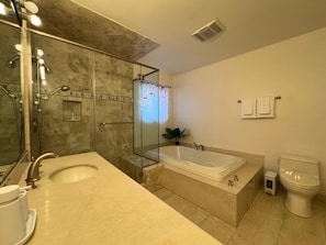 Jetted bath, hair dryer, towels, soap