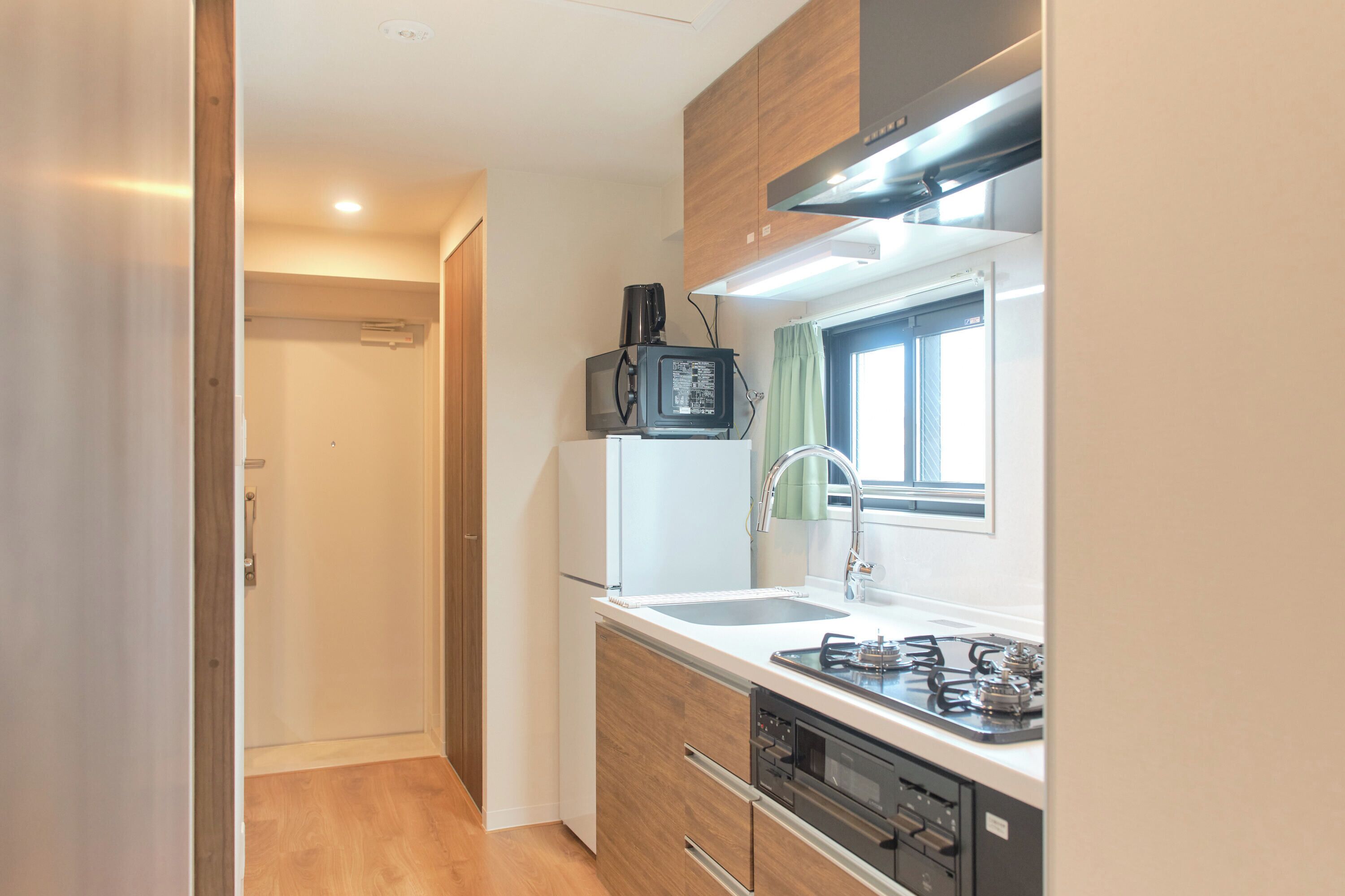 Fridge, microwave, stovetop, cookware/dishes/utensils