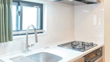 Fridge, microwave, stovetop, cookware/dishes/utensils