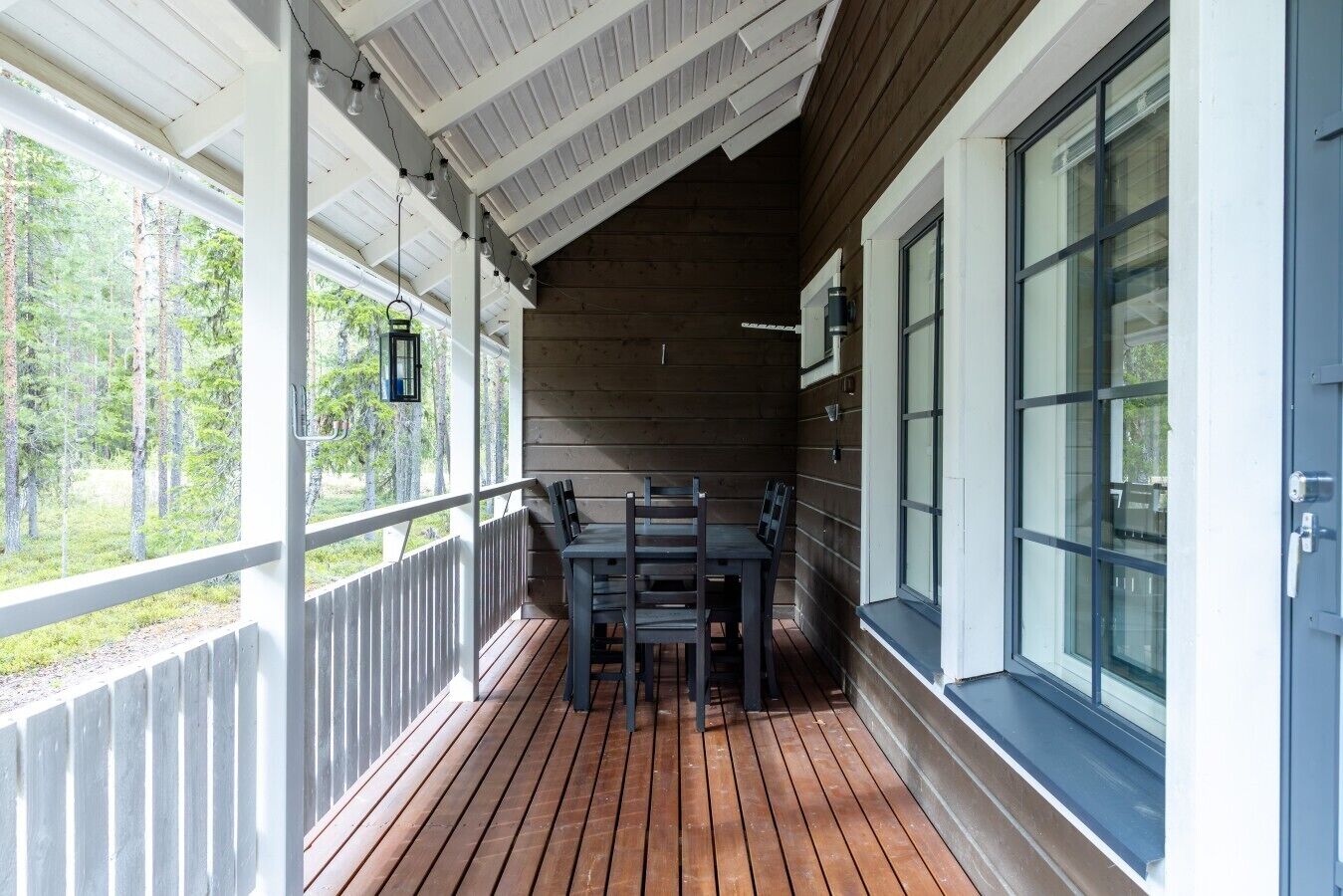 Enjoy your morning coffee or an alfresco dinner in the fresh air on the covered terrace. The surrounding forest provides a peaceful, private backdrop for your meals, rain or shine.