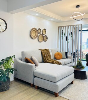 Appartement Supérieur, vue ville | Coin séjour
