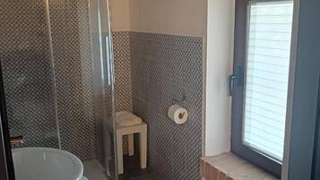 Classic Single Room | Bathroom | Shower, hair dryer, towels, soap