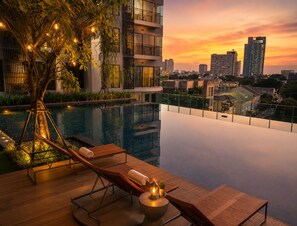 Indoor pool, outdoor pool - Cozy 1-bedroom apartment in soothing Krung Thep Maha Nakhon with Train Access (Krung Thep Maha Nakhon)
