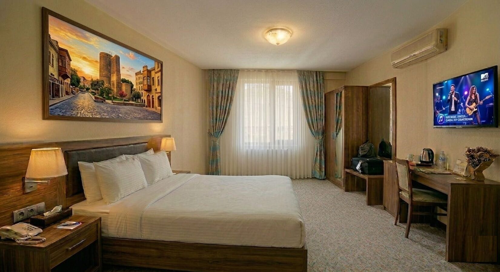 Premium bedding, desk, laptop workspace, soundproofing