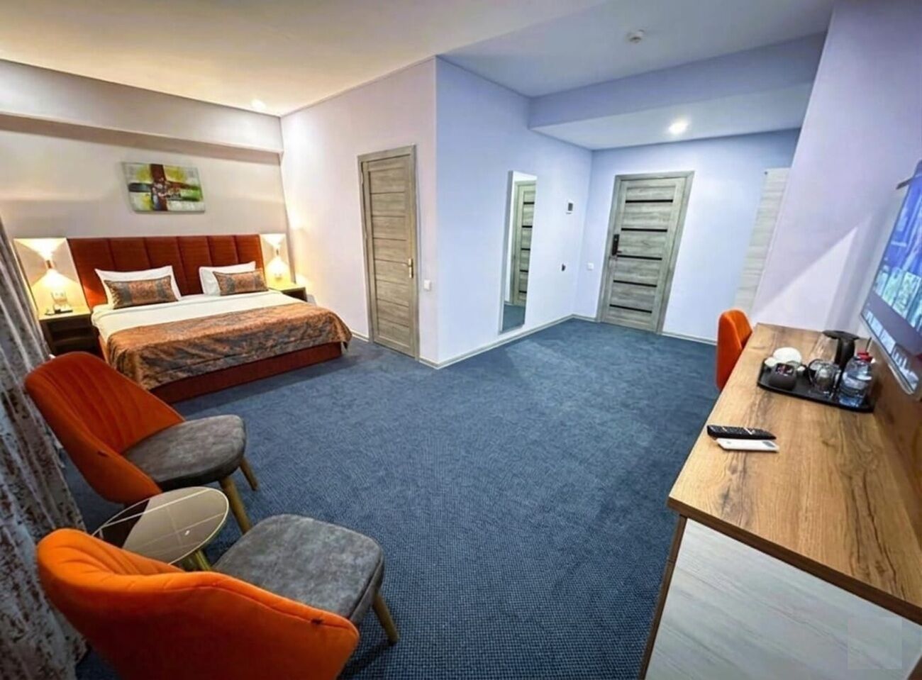 Premium bedding, desk, laptop workspace, soundproofing
