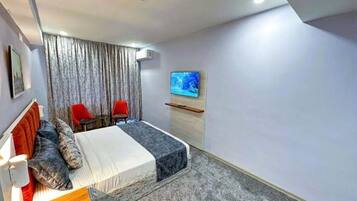 Premium bedding, desk, laptop workspace, soundproofing