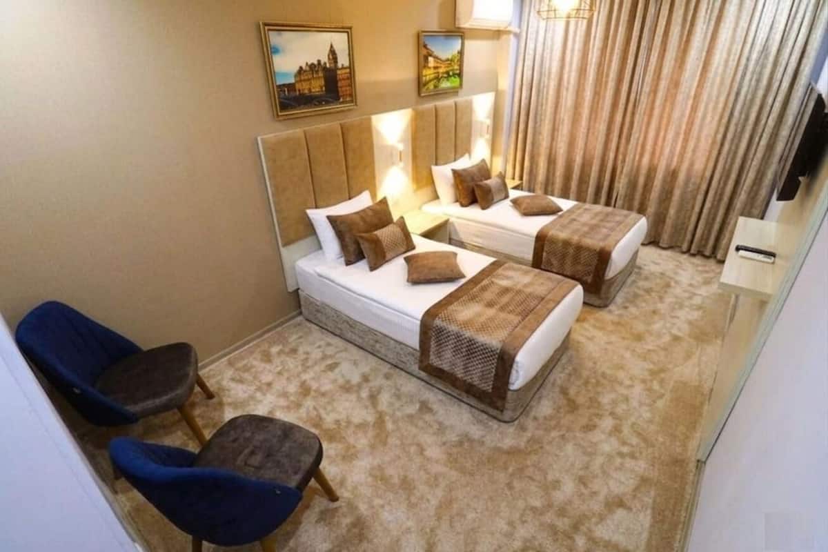 Standard Twin Room, Courtyard View | Premium bedding, desk, laptop workspace, soundproofing