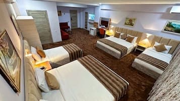 Family Suite, City View | Premium bedding, desk, laptop workspace, soundproofing