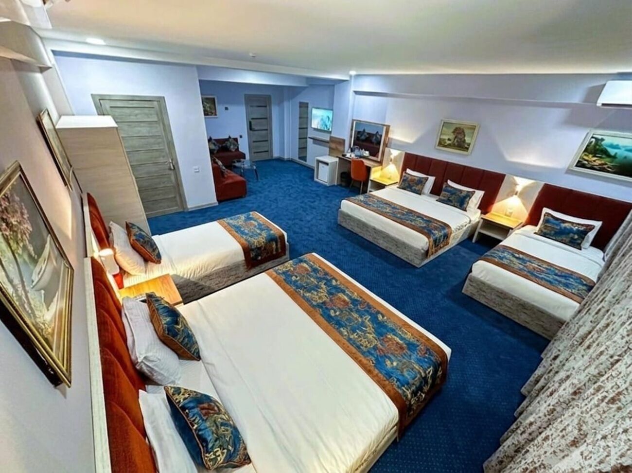 Premium bedding, desk, laptop workspace, soundproofing