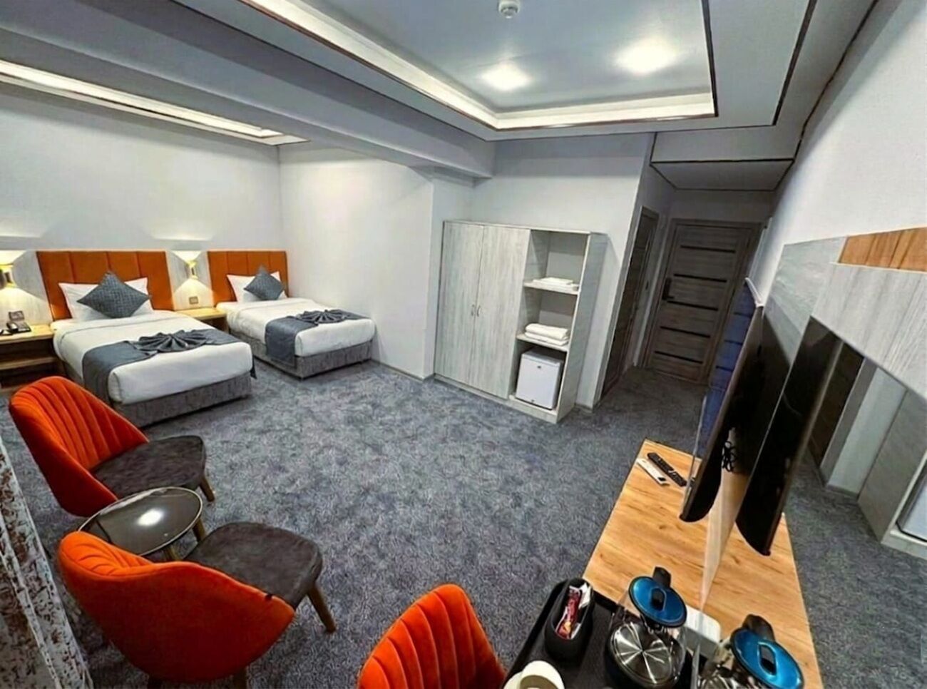 Premium bedding, desk, laptop workspace, soundproofing