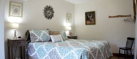 1 bedroom, desk, iron/ironing board, travel crib