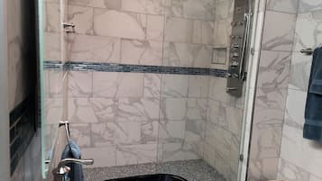 Jetted tub, hair dryer, towels, soap
