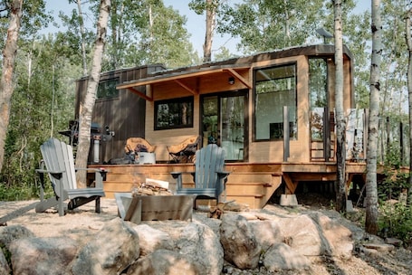 Property grounds. Alberta Glamping Tiny House with Sauna for Romantic Weekend Getaways Away from the City