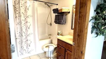 Jetted tub, hair dryer, towels, soap