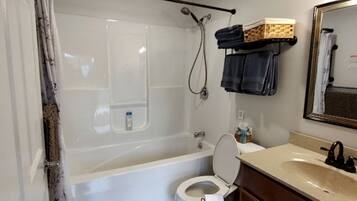 Hair dryer, towels, soap, shampoo