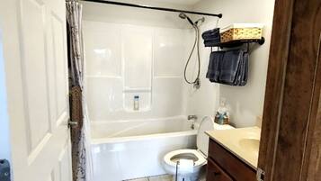 Hair dryer, towels, soap, shampoo