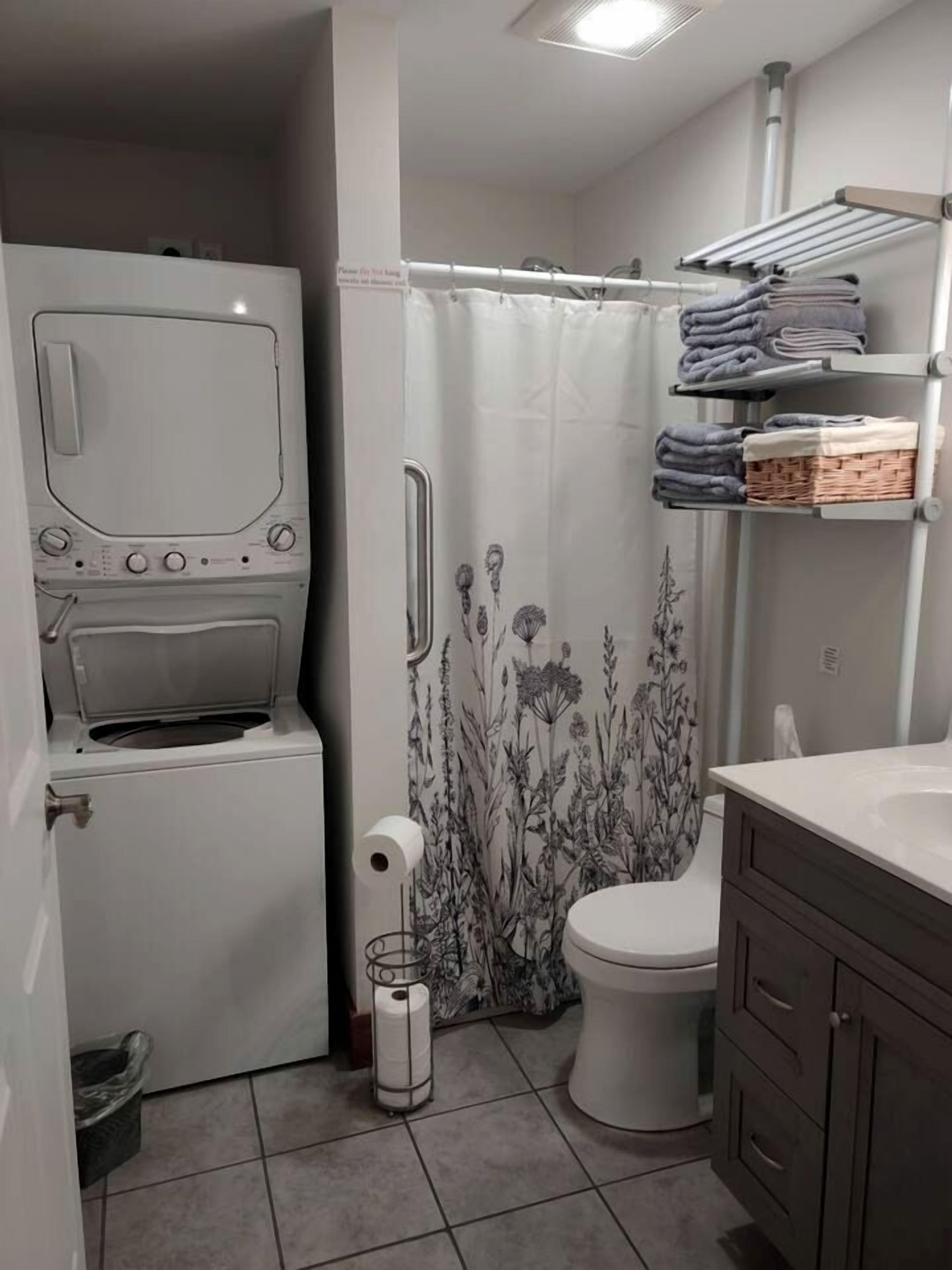 Hair dryer, towels, soap, shampoo