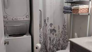 Hair dryer, towels, soap, shampoo