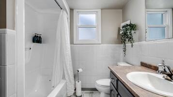 Jetted bath, hair dryer, towels, soap