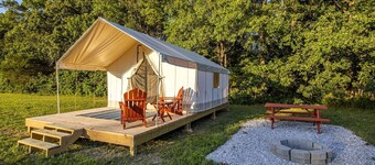Gorgeous Secluded Tented Cabin Fire Pit Provided in Cassville, Missouri