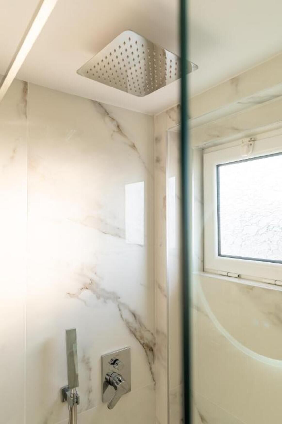 Deluxe Triple Room, Balcony | Bathroom | Shower, hair dryer, towels, soap