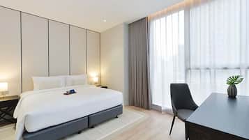 In-room safe, desk, laptop workspace, blackout curtains