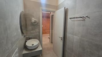 Apartment, Balcony, Sea View | Bathroom | Shower, hair dryer, towels, toilet paper