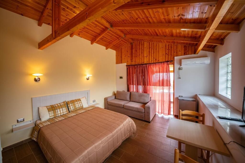 Quarto casal superior, sacada, vista para o mar | Parte interna