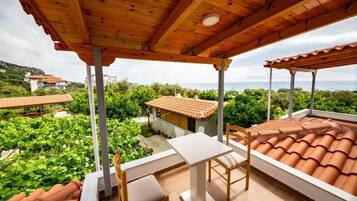 Standard Double Room, Balcony, Sea View | Outdoor dining
