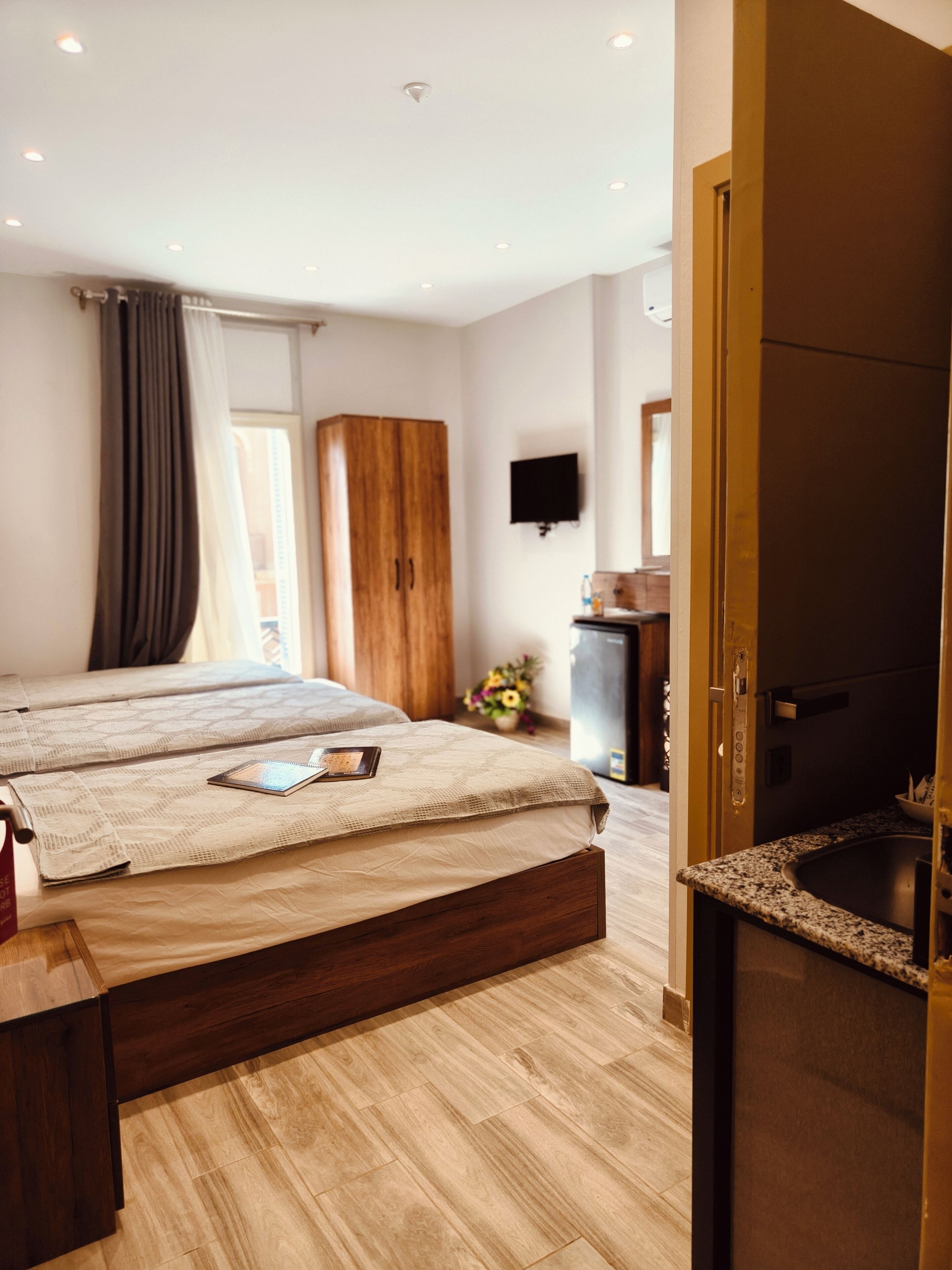 Luxury Triple Room, City View | In-room safe, blackout drapes, iron/ironing board, free WiFi