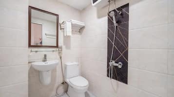 Shower, hair dryer, slippers, towels
