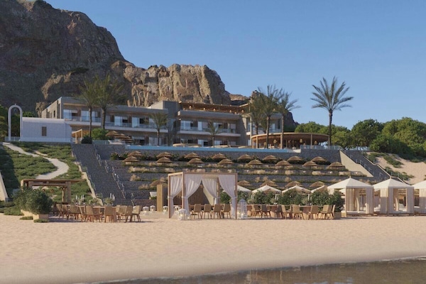 On the beach, free beach cabanas, sun-loungers, beach umbrellas