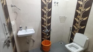 Buồng tắm vòi sen, khăn tắm