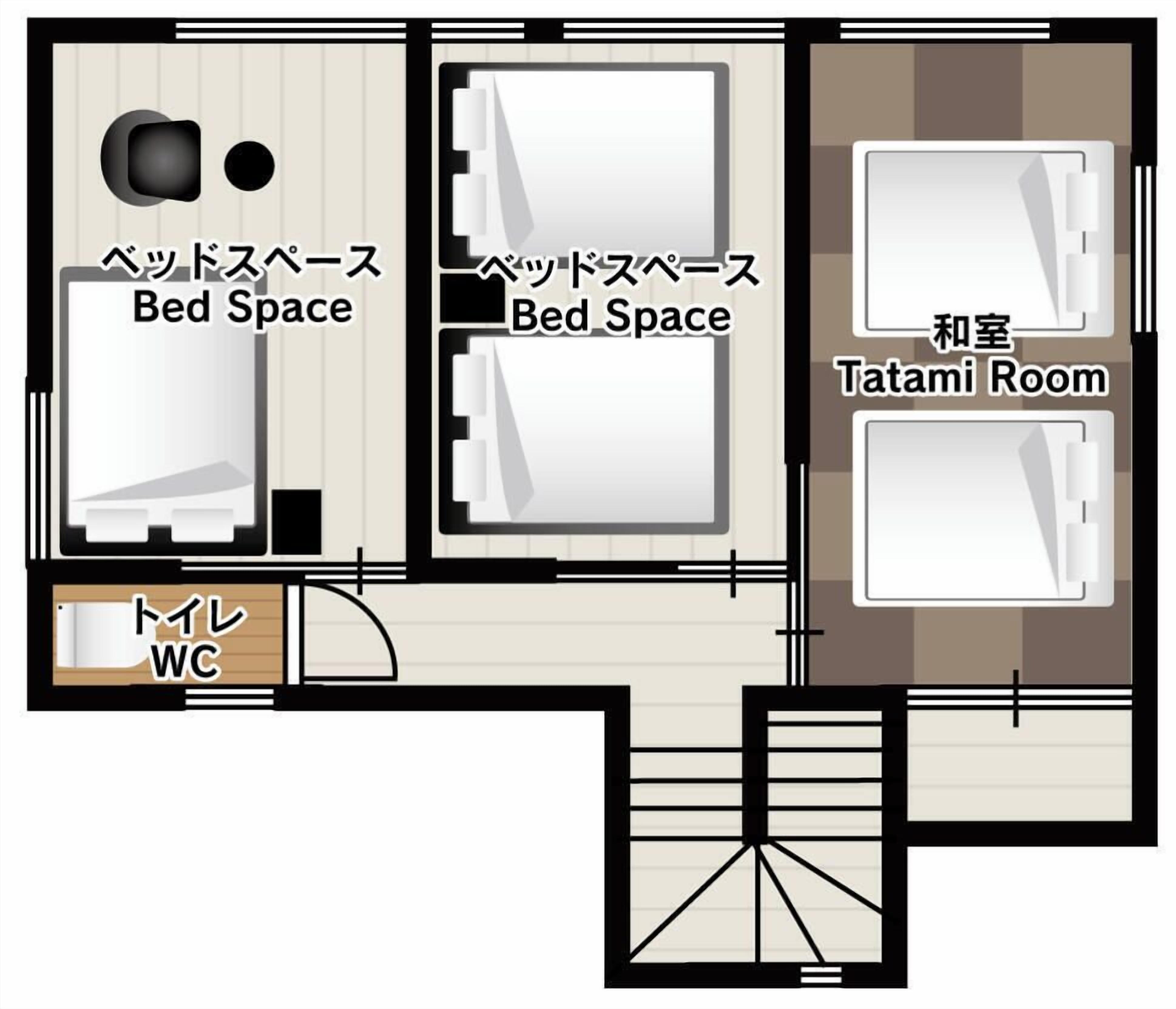 A floor plan with two bed spaces, a tatami room, and a WC.