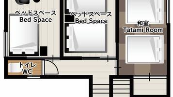 A floor plan with two bed spaces, a tatami room, and a WC.