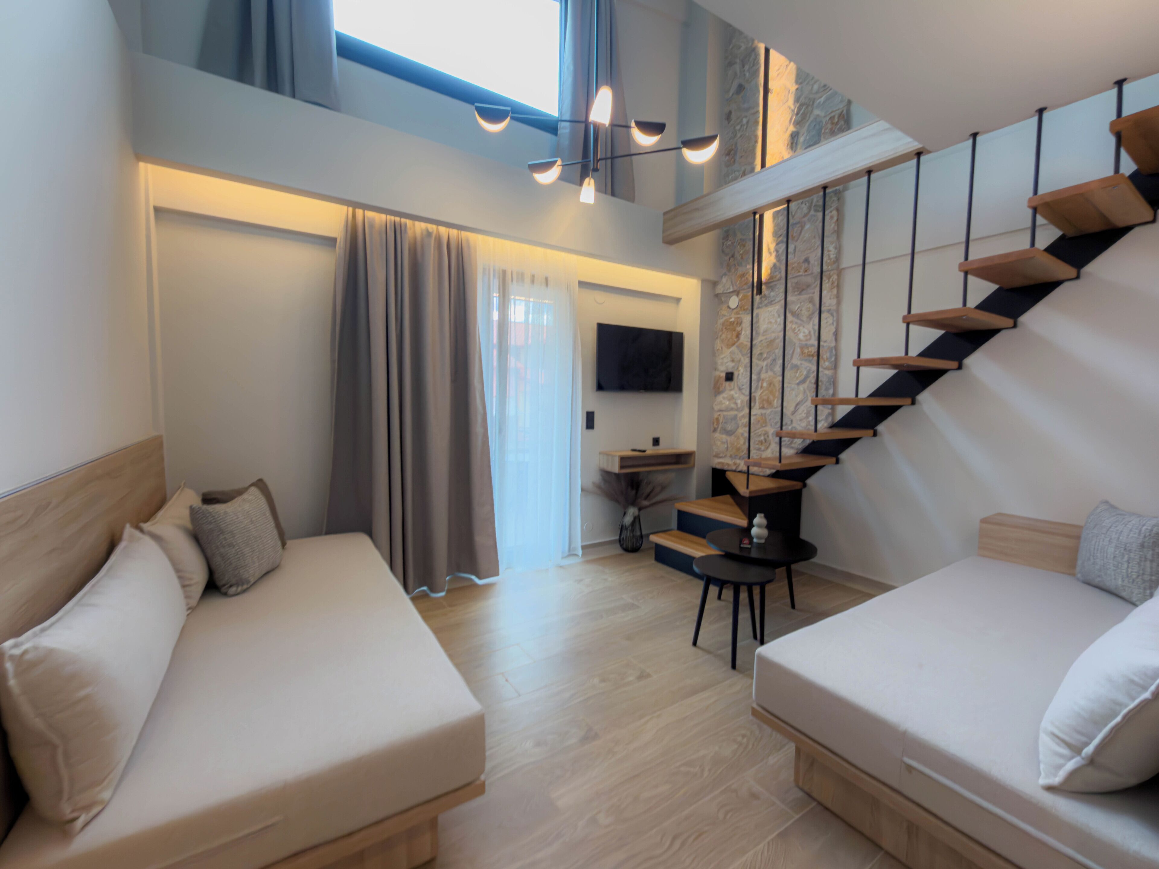 Deluxe Room - Split Level with Mountain View & Sea View | Living area | 43-inch Smart TV with digital channels