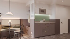 A modern kitchen with a built-in microwave, a dining area with a round table and a chair, and a bench with a vase. - Bob W Vienna Döbling (Vienna)