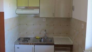 Departamento (A1) | Cocina privada | Cafetera y tetera, refrigerador y parrilla de estufa