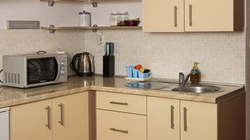 Apartment (A1) | Private kitchen | Espresso maker, fridge, microwave, oven