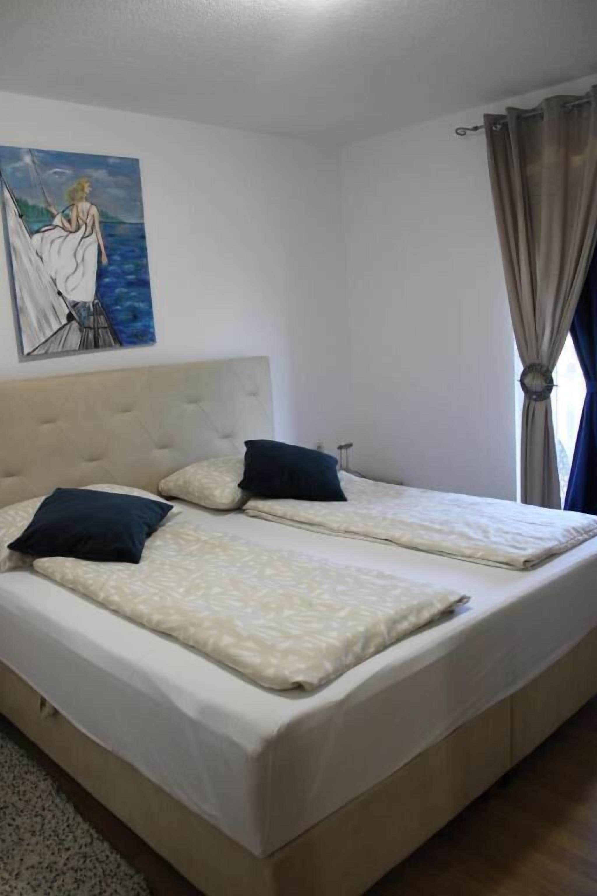 House | Iron/ironing board, cribs (free), WiFi (free)