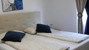 House | Iron/ironing board, cribs (free), WiFi (free)
